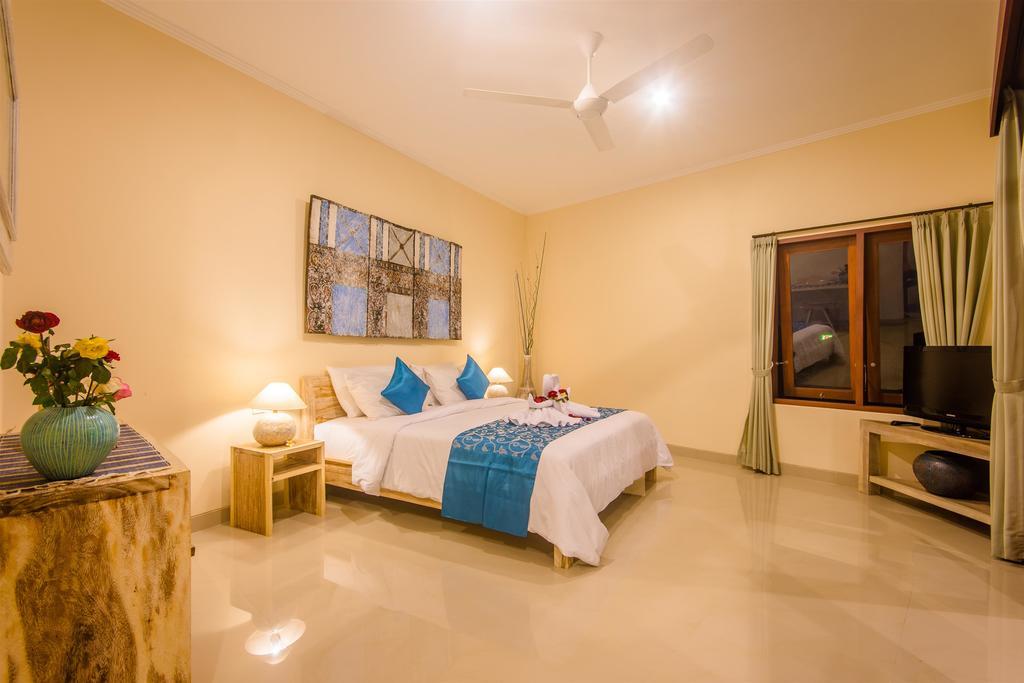 Villa Tepi Sungai Легиан Номер фото