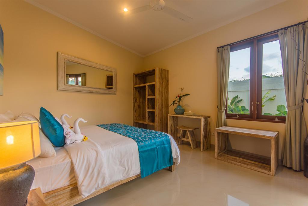 Villa Tepi Sungai Легиан Номер фото